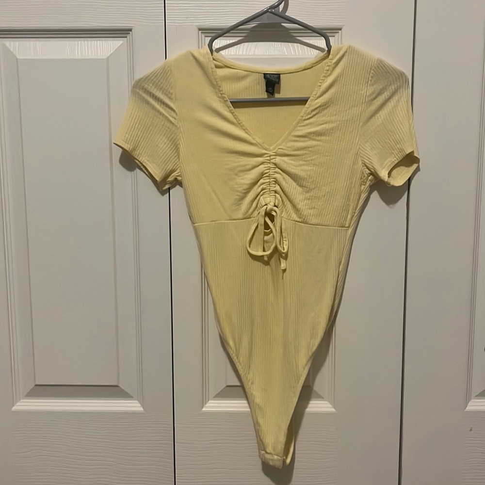 Yellow body suit